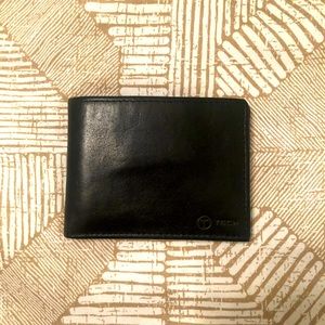 Tumi T-Tech black leather wallet